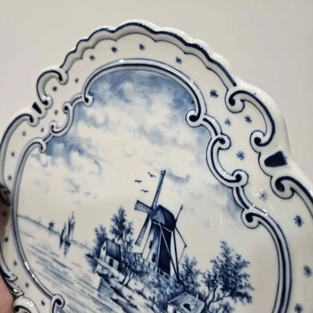 Blue and white windmill decorative plate